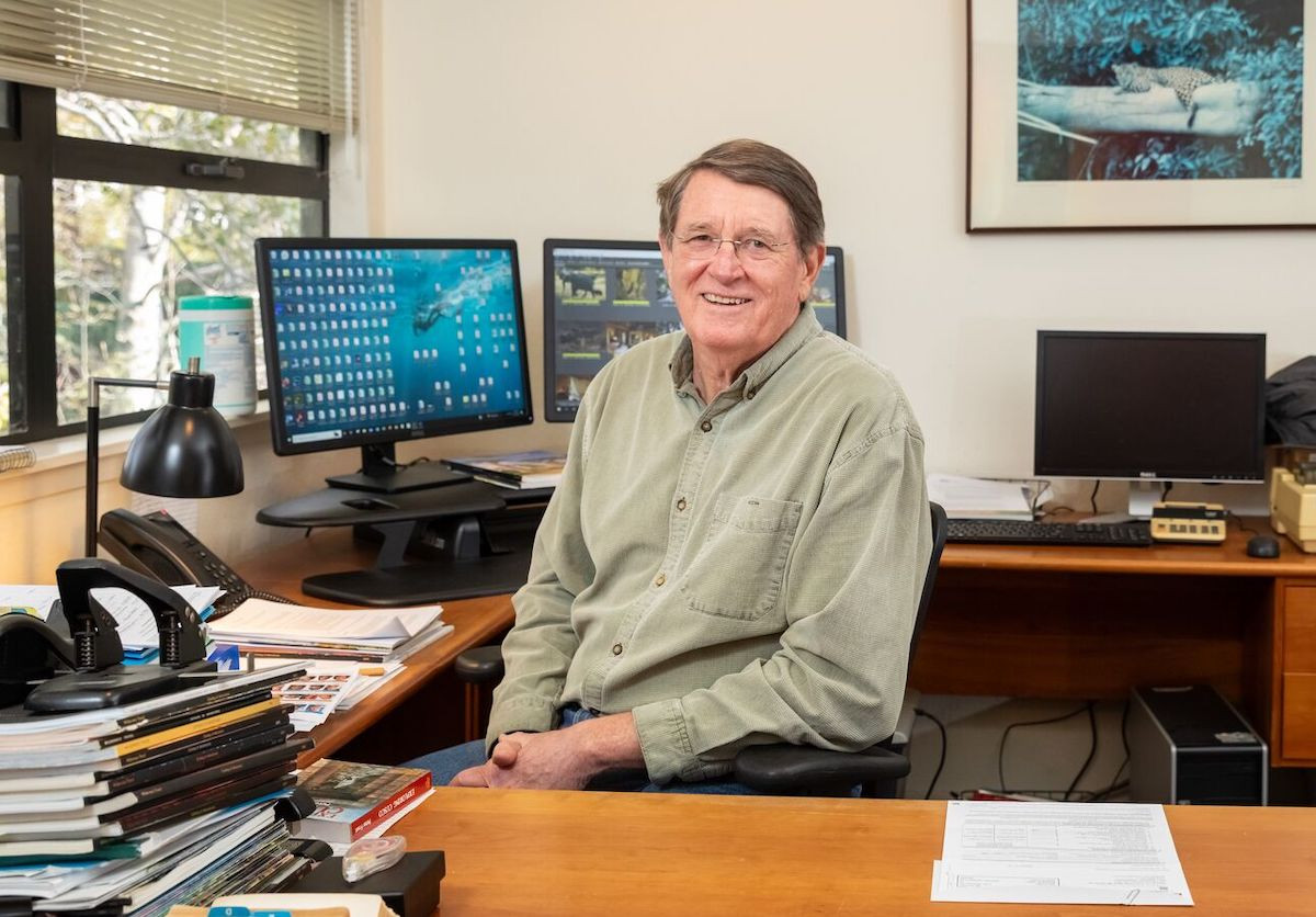 Bill Abbott, the founder of Wilderness Travel, pictured in his office in Berkeley's Gilman District, showcasing the local roots of this global adventure travel company.