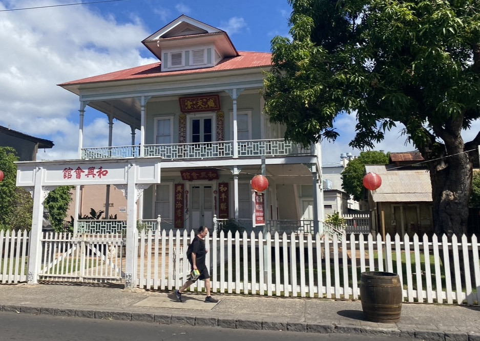 The Wo Hing Temple Museum in Lahaina, a historical landmark cherished by Chinese immigrants and tourists, pictured before the Maui wildfires, symbolizing the cultural heritage the travel industry is working to help preserve and rebuild.
