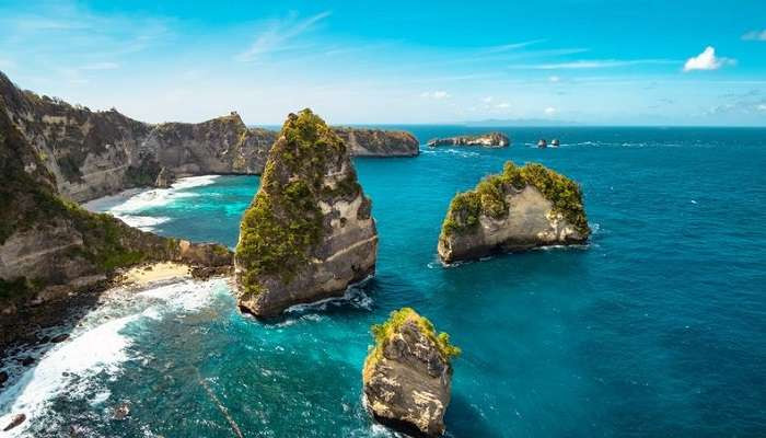Bali, Indonesia, showcasing its lush landscapes and temples. Perfect for exploring temples and beaches in Asia in August.