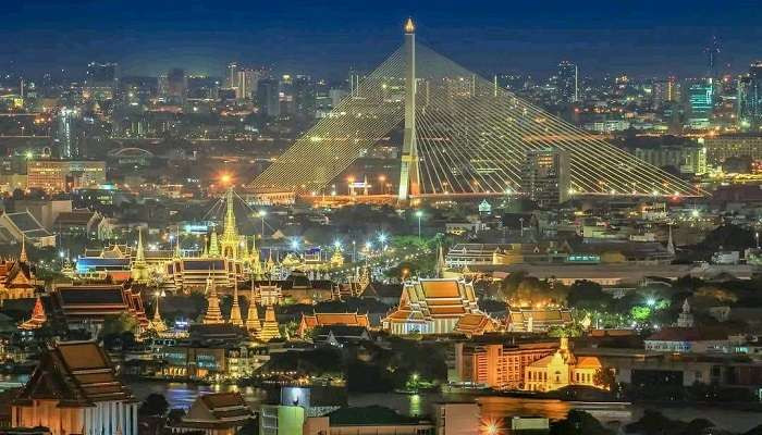 Bangkok, Thailand, showcasing its vibrant street life and temples. Perfect for shopping and cultural experiences in Asia in August.