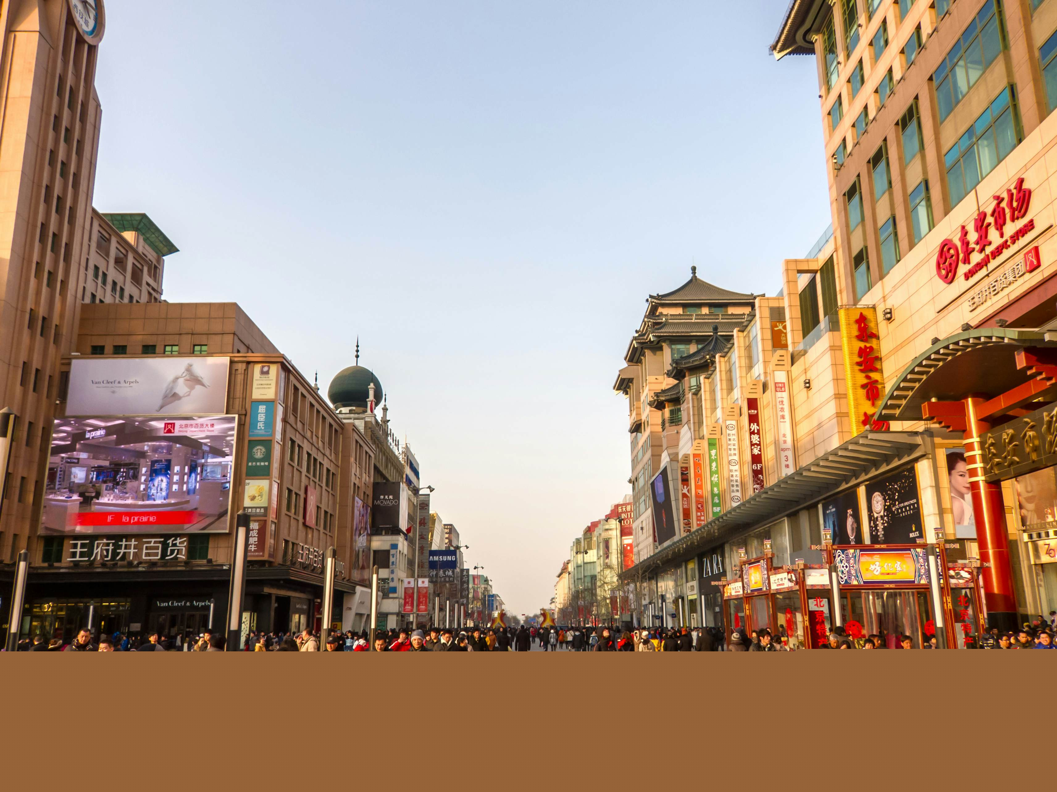 Crowds of people on a shopping street in Beijing