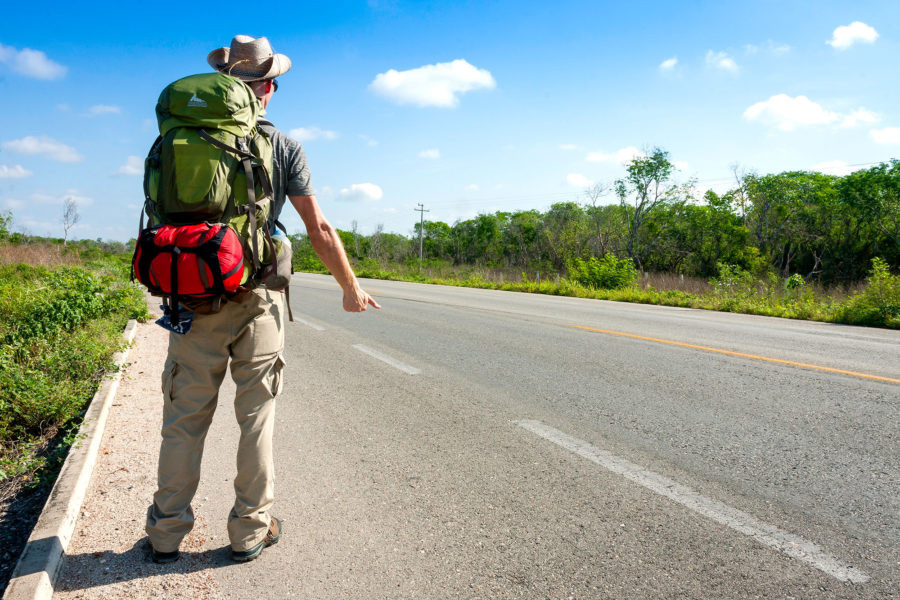 Family hiking with backpacks